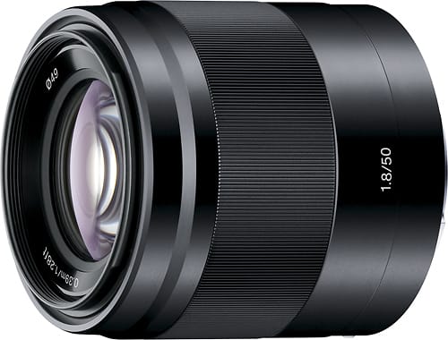 Sony 50mm f/1.8 lens mounted on a camera in a studio setting