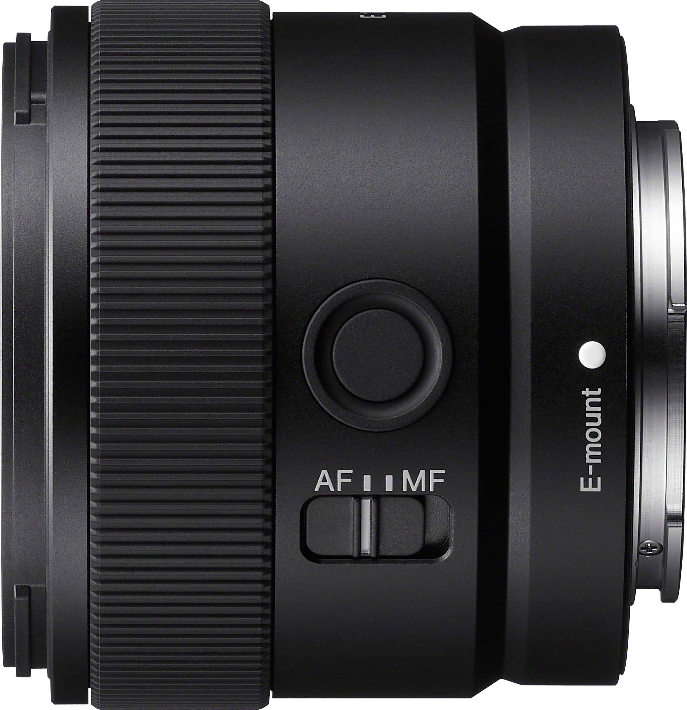 Sony E 11mm F1.8 lens mounted on a camera in an outdoor setting